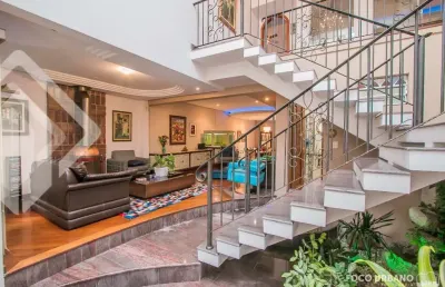 Casa em condomínio fechado com 3 quartos à venda na rua maestro salvador campanella, 395, jardim itu sabará, porto alegre, 397 m2 por r$ 1.499.000