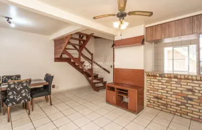 Casa em condomínio fechado com 3 quartos à venda na avenida joão ferreira jardim, 140, parque santa fé, porto alegre, 116 m2 por r$ 500.000