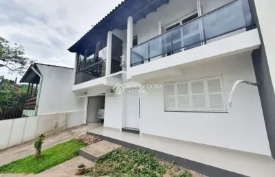 Casa em condomínio fechado com 3 quartos à venda na rua comendador albino cunha, 261, cristo redentor, porto alegre, 240 m2 por r$ 1.100.000