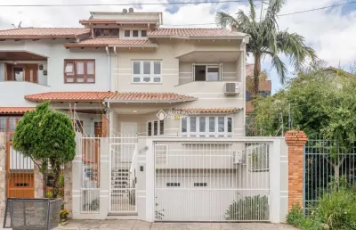 Casa com 3 quartos à venda na rua professor isidoro la porta, 112, jardim itu sabará, porto alegre, 390 m2 por r$ 1.609.500