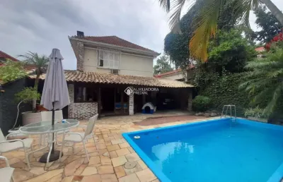 Casa em condomínio fechado com 4 quartos à venda na rua camerino, 152, petrópolis, porto alegre, 390 m2 por r$ 1.650.000