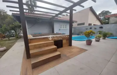 Casa em condomínio fechado com 2 quartos à venda na avenida independência, 395, flórida, guaíba, 205 m2 por r$ 760.000