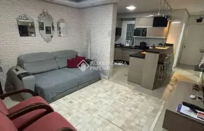 Casa com 2 quartos à venda na rua biguás, 481, jardim algarve, alvorada, 98 m2 por r$ 340.000