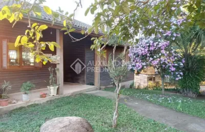 Casa em condomínio fechado com 3 quartos à venda na rua maurílio ferreira, 370, campo novo, porto alegre, 200 m2 por r$ 310.000