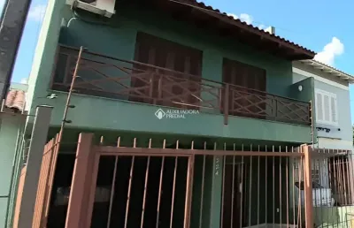 Casa com 4 quartos à venda na rua constantino fernando onorato bottin, 224, hípica, porto alegre, 200 m2 por r$ 460.000