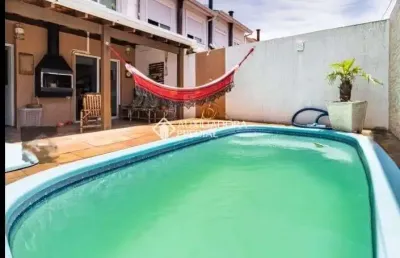Casa em condomínio fechado com 3 quartos à venda na avenida edgar pires de castro - de 1740 a 2238 - l, 2520, hípica, porto alegre, 83 m2 por r$ 408.000