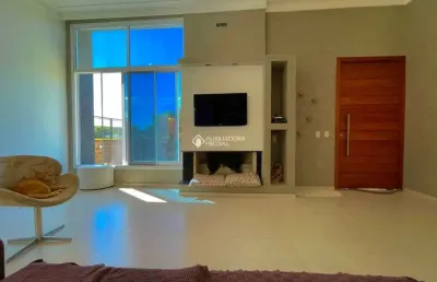 Casa com 3 quartos à venda na rua luiz delfino, 210, espírito santo, porto alegre, 155 m2 por r$ 999.900