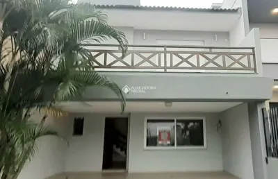 Casa em condomínio fechado com 3 quartos à venda na rua angico, 49, hípica, porto alegre, 143 m2 por r$ 680.000