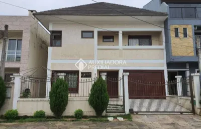 Casa em condomínio fechado com 3 quartos à venda na rua guatambu, 833, hípica, porto alegre, 256 m2 por r$ 800.000