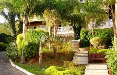 Casa em condomínio fechado com 3 quartos à venda na rua professor xavier simões, 495, tristeza, porto alegre, 208 m2 por r$ 1.450.000