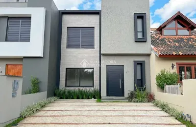 Casa em condomínio fechado com 3 quartos à venda na rua jean vardaramatos, 130, hípica, porto alegre, 153 m2 por r$ 810.000
