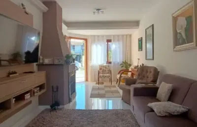 Casa com 3 quartos à venda na rua edgar sanches laurent, 46, hípica, porto alegre, 180 m2 por r$ 750.000