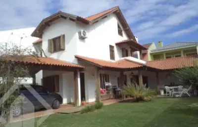 Casa em condomínio fechado com 3 quartos à venda na rua corticeira, 143, hípica, porto alegre, 216 m2 por r$ 980.000