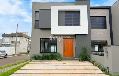 Casa em condomínio fechado com 3 quartos à venda na rua jean vardaramatos, 130, hípica, porto alegre, 157 m2 por r$ 910.000