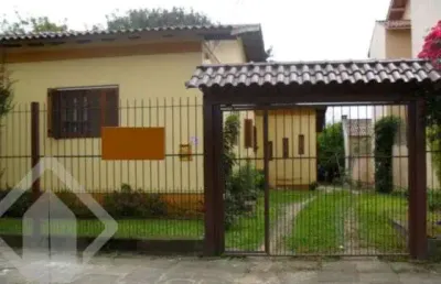 Casa com 3 quartos à venda na rua dona zulmira, 158, cavalhada, porto alegre, 220 m2 por r$ 585.000