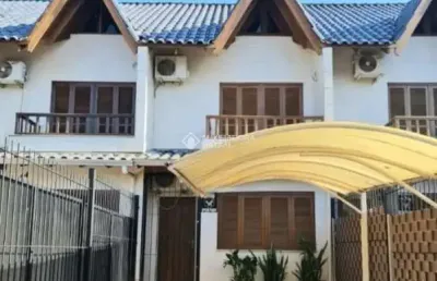 Casa com 2 quartos à venda na rua heitor kramer, 250, guarujá, porto alegre, 83 m2 por r$ 422.990