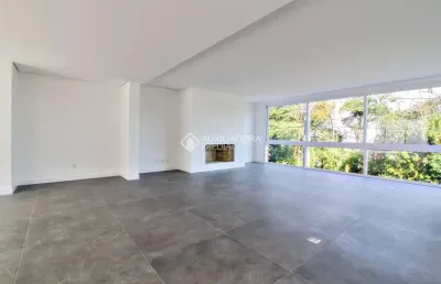 Casa em condomínio fechado com 3 quartos à venda na rua ivo walter kern, 599, hípica, porto alegre, 256 m2 por r$ 1.670.000