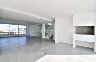 Casa em condomínio fechado com 3 quartos à venda na rua ivo walter kern, 599, hípica, porto alegre, 256 m2 por r$ 1.595.000