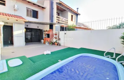 Casa em condomínio fechado com 3 quartos à venda na rua edgar sanches laurent, 77, hípica, porto alegre, 124 m2 por r$ 569.000