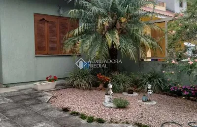 Casa com 3 quartos à venda na rua heitor kramer, 321, guarujá, porto alegre, 114 m2 por r$ 599.000
