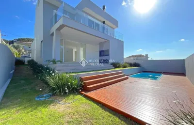 Casa em condomínio fechado com 4 quartos à venda na estrada das três meninas, 2001, vila nova, porto alegre, 293 m2 por r$ 2.390.000