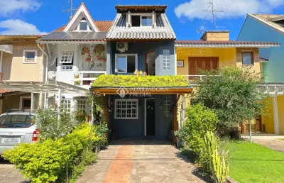 Casa em condomínio fechado com 3 quartos à venda na avenida juca batista, 1458, cavalhada, porto alegre, 132 m2 por r$ 595.000