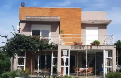 Fazenda à venda na rua oito mil e quatorze, 340, lageado, porto alegre, 250 m2 por r$ 590.000