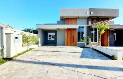 Casa em condomínio fechado com 3 quartos à venda na avenida juca batista, 5505, hípica, porto alegre, 164 m2 por r$ 699.000