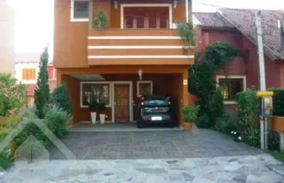 Casa com 3 quartos à venda na rua fernando jorge schneider, 113, hípica, porto alegre, 150 m2 por r$ 615.000