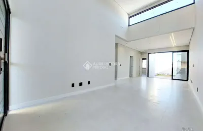 Casa em condomínio fechado com 3 quartos à venda na avenida juca batista, 5505, hípica, porto alegre, 93 m2 por r$ 650.000