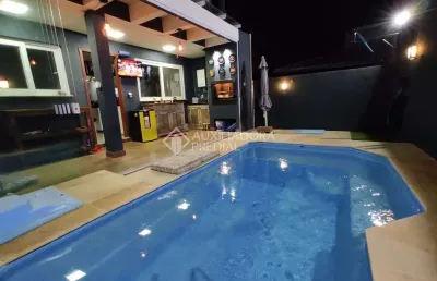 Casa em condomínio fechado com 3 quartos à venda na rua guatambu, 271, hípica, porto alegre, 140 m2 por r$ 768.000