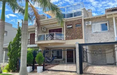 Casa com 3 quartos à venda na rua guatambu, 618, hípica, porto alegre, 254 m2 por r$ 790.000