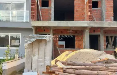 Casa em condomínio fechado com 3 quartos à venda na rua embira, 97, hípica, porto alegre, 122 m2 por r$ 560.000