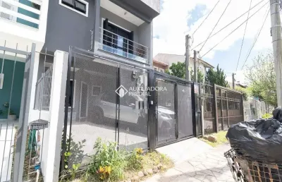 Casa em condomínio fechado com 3 quartos à venda na rua pau brasil, 539, hípica, porto alegre, 149 m2 por r$ 640.000