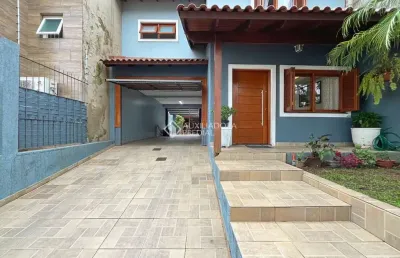 Casa em condomínio fechado com 3 quartos à venda na rua sargento bruno feldmann, 80, guarujá, porto alegre, 200 m2 por r$ 699.000