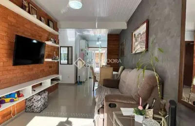 Casa com 2 quartos à venda na rua newton silveira netto, 205, hípica, porto alegre, 67 m2 por r$ 315.000
