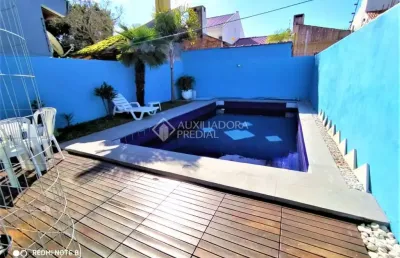 Casa em condomínio fechado com 3 quartos à venda na rua carlos scliar, 99, hípica, porto alegre, 183 m2 por r$ 696.900