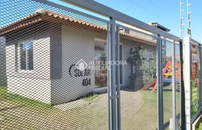 Casa em condomínio fechado com 2 quartos à venda na rua santa mônica, 404, ponta grossa, porto alegre, 60 m2 por r$ 212.000