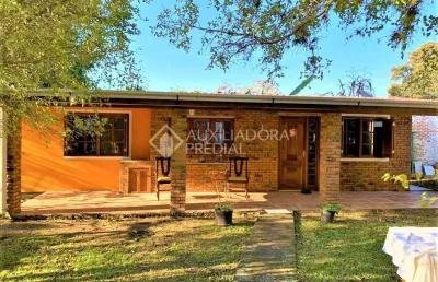 Casa em condomínio fechado com 4 quartos à venda na avenida desembargador mello guimarães, 235, belém novo, porto alegre, 181 m2 por r$ 750.000