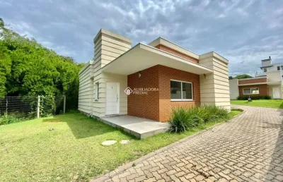 Casa em condomínio fechado com 3 quartos à venda na rua canísio binsfeld, 226, hípica, porto alegre, 123 m2 por r$ 599.000