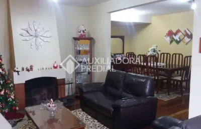 Casa em condomínio fechado com 3 quartos à venda na avenida icaraí, 171, cristal, porto alegre, 217 m2 por r$ 1.090.000