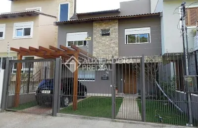 Casa em condomínio fechado com 3 quartos à venda na rua henrique anawate, 590, guarujá, porto alegre, 240 m2 por r$ 850.000