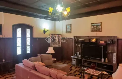 Casa em condomínio fechado com 3 quartos à venda na avenida heitor vieira, 48, belém novo, porto alegre, 160 m2 por r$ 640.000