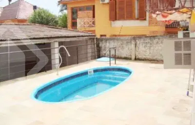Casa em condomínio fechado com 3 quartos à venda na rua doutor pereira neto, 1364, tristeza, porto alegre, 150 m2 por r$ 495.000