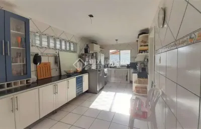 Casa em condomínio fechado com 4 quartos à venda na avenida joracy camargo, 74, santa tereza, porto alegre, 229 m2 por r$ 450.000