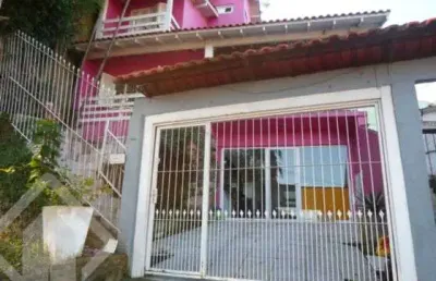 Casa em condomínio fechado com 3 quartos à venda na rua erechim, 70, nonoai, porto alegre, 300 m2 por r$ 600.000