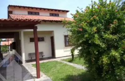 Casa em condomínio fechado com 4 quartos à venda na travessa alfredo magalhães, 81, cavalhada, porto alegre, 240 m2 por r$ 930.000