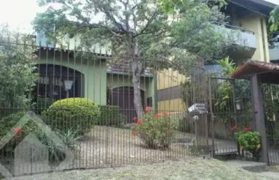 Casa em condomínio fechado com 4 quartos à venda na rua comandai, 560, cristal, porto alegre, 300 m2 por r$ 850.000