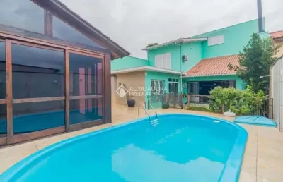 Casa em condomínio fechado com 4 quartos à venda na rua olegário dias maciel, 350, espírito santo, porto alegre, 330 m2 por r$ 1.220.000