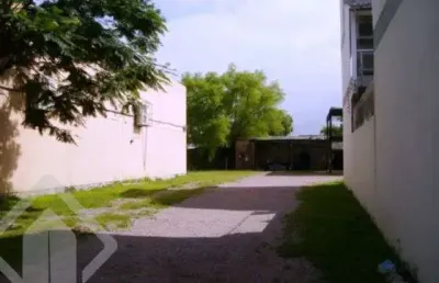 Terreno em condomínio fechado à venda na avenida juca batista, 1358, cavalhada, porto alegre, 1032 m2 por r$ 1.399.000